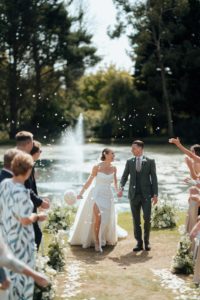 Seckford Hall outdoor ceremony lake wedding