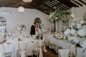 Woodhall Manor Ballroom bride and groom wedding white flowers