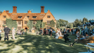 Garden guests Woodhall Manor wedding